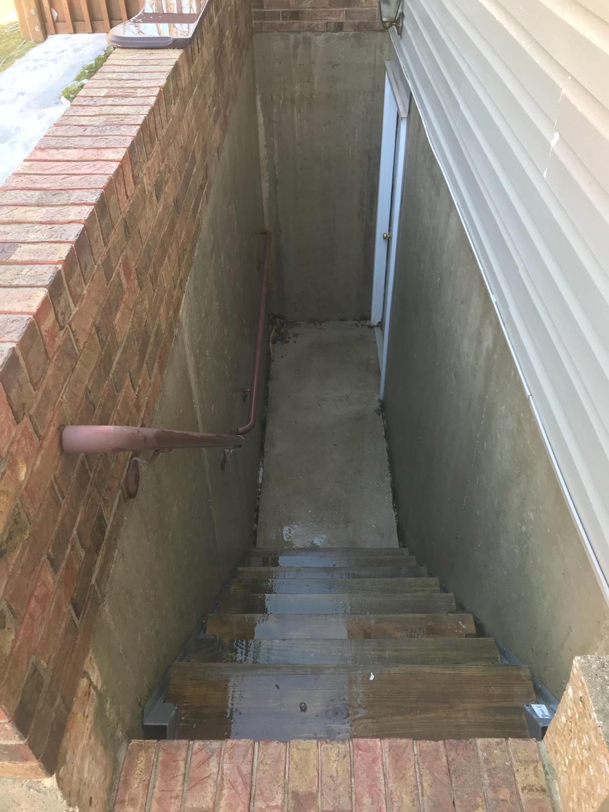 Patio After Pressure Washing  by Maryland Pro Wash, now free from mold, algae, and stains. the lighting can now reach the bottom of the steps which creates a visible pathway and makes the steps safer to walk on. 