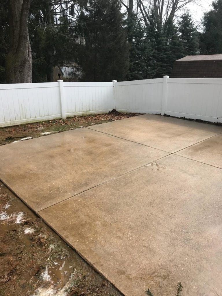 After Pressure Washing Cement Backyard of a Residential House By Maryland Pro Wash 