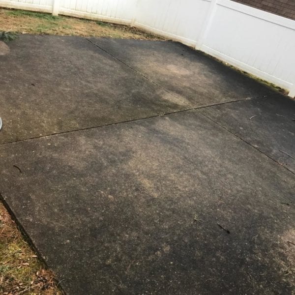 Transform your worn, dark concrete patio into a refreshed and vibrant outdoor space with Maryland Pro Wash, the leading pressure washing service provider in Harford County MD, Baltimore County MD, Cecil County MD, Howard County MD, Carroll County MD, Anne Arundel County MD. We also proudly serve Wilmington DE, New Castle County DE, and Delaware County PA.

Our professional team specializes in revitalizing aged surfaces through expert pressure washing techniques. Whether it's removing visible discoloration or addressing small cracks on your concrete patio—bordered by a pristine white fence with lush grass and trees beyond—Maryland Pro Wash offers top-notch cleaning services that breathe new life into your property.

Don't let time-worn surfaces detract from the beauty of your home. Contact Maryland Pro Wash today to schedule our reliable and effective pressure washing services. Watch as we transform your aged patio into a clean and inviting space you can enjoy year-round.