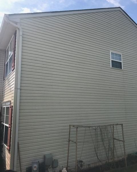 Maryland Pro Wash is your go-to service for pressure washing in the heart of the Mid-Atlantic region, ranging from Harford County MD to Wilmington DE and beyond. Picture your beautiful two-story home with its beige vinyl siding and distinctive red shutters gleaming like new after a professional wash. Our expert team can rejuvenate that single upper-floor window, ensuring it sparkles, while also giving special care to your charming garden area at the base of the house. Whether you're in Baltimore County or New Castle County, our services extend to various types of homes and outdoor structures, including those wooden trellises that enhance your garden's appeal. Choose Maryland Pro Wash to bring back the brilliance to every corner of your home across Maryland, Delaware, and Pennsylvania areas.