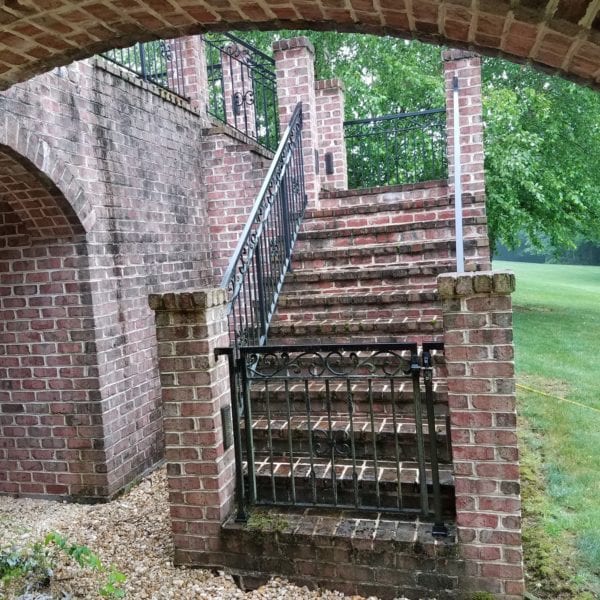 Maryland Pro Wash specializes in revitalizing outdoor spaces with top-notch pressure washing services across several counties, including Harford County, Baltimore County, Cecil County, Howard County, Carroll County, Anne Arundel County in Maryland as well as Wilmington and New Castle County in Delaware and Delaware County in Pennsylvania. Whether it's a charming brick stairway leading up to a lush grassy area lined with trees or the intricate details of a wrought iron railing under a historic brick archway—their expert team ensures these surfaces are impeccably clean. Utilizing state-of-the-art equipment and eco-friendly solutions, Maryland Pro Wash transforms everything from small gravel areas at the base of stairs to expansive patios and driveways into pristine showcases. Choose them for maintaining the beauty and longevity of your property's exterior features.