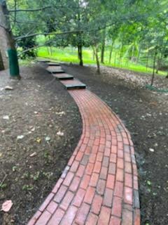 After Pressure Washing Red Brick Sidewalk Through Park and its Trail By Maryland Pro Wash