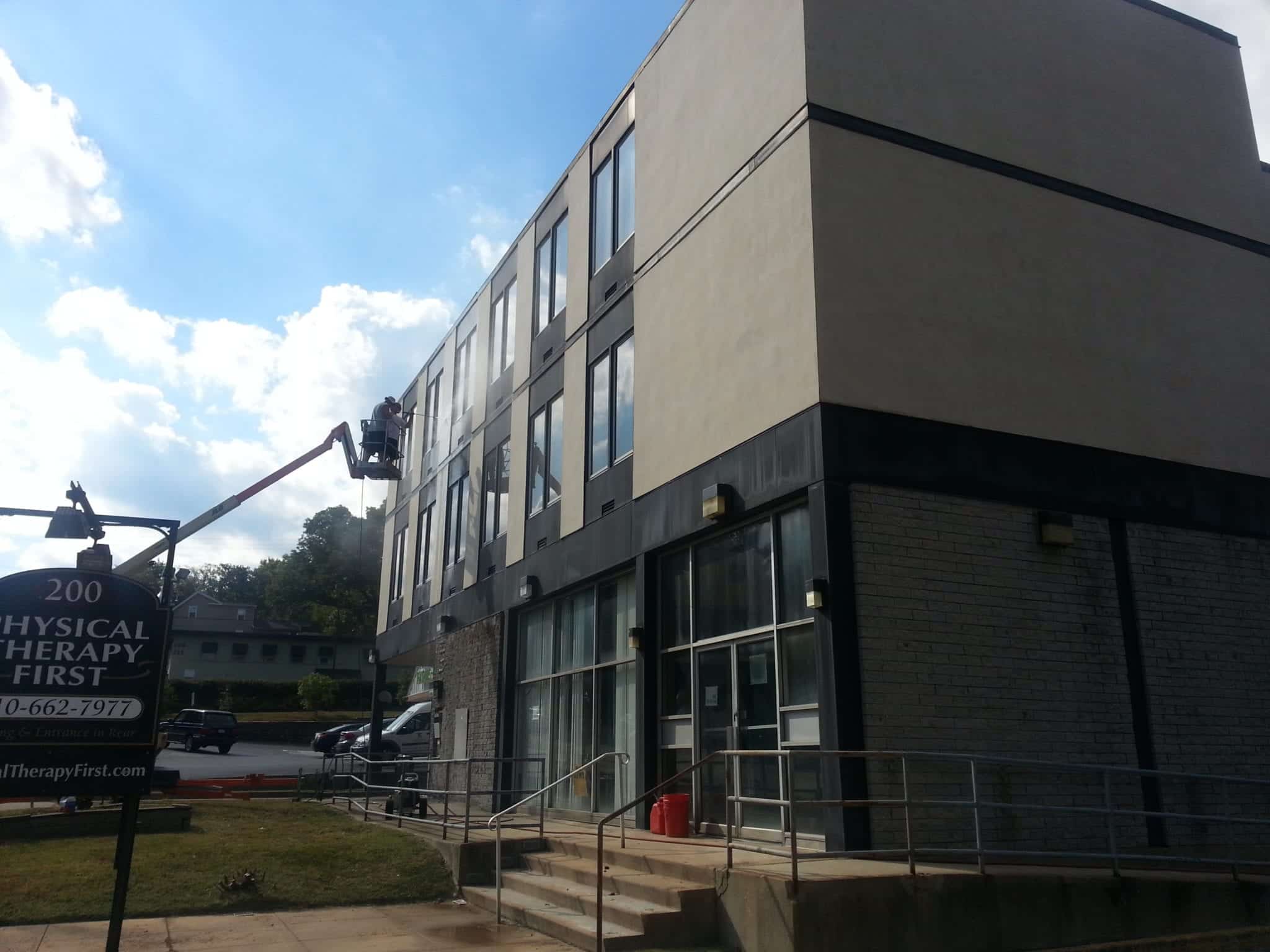 Pressure Washing Commercial Building using a Lift By Maryland Pro Wash 