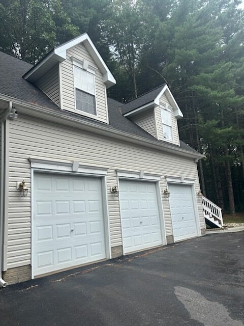 After Washing Front Garage Of White Residential House By Maryland Pro Wash 