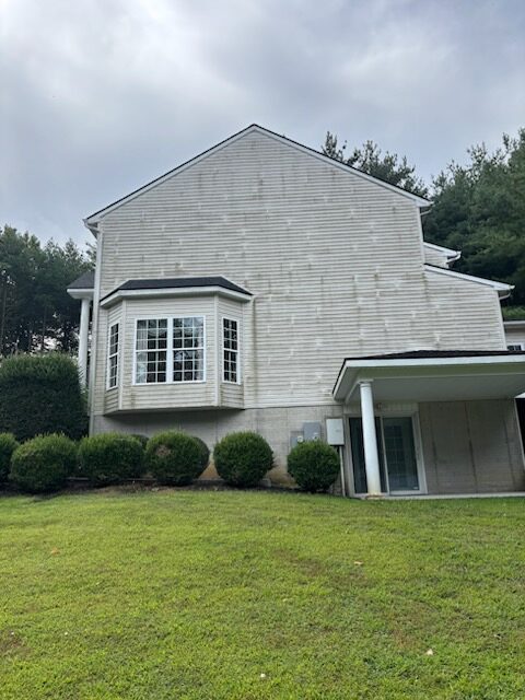 Before Washing the Side of a residential White House By Maryland Pro Wash 