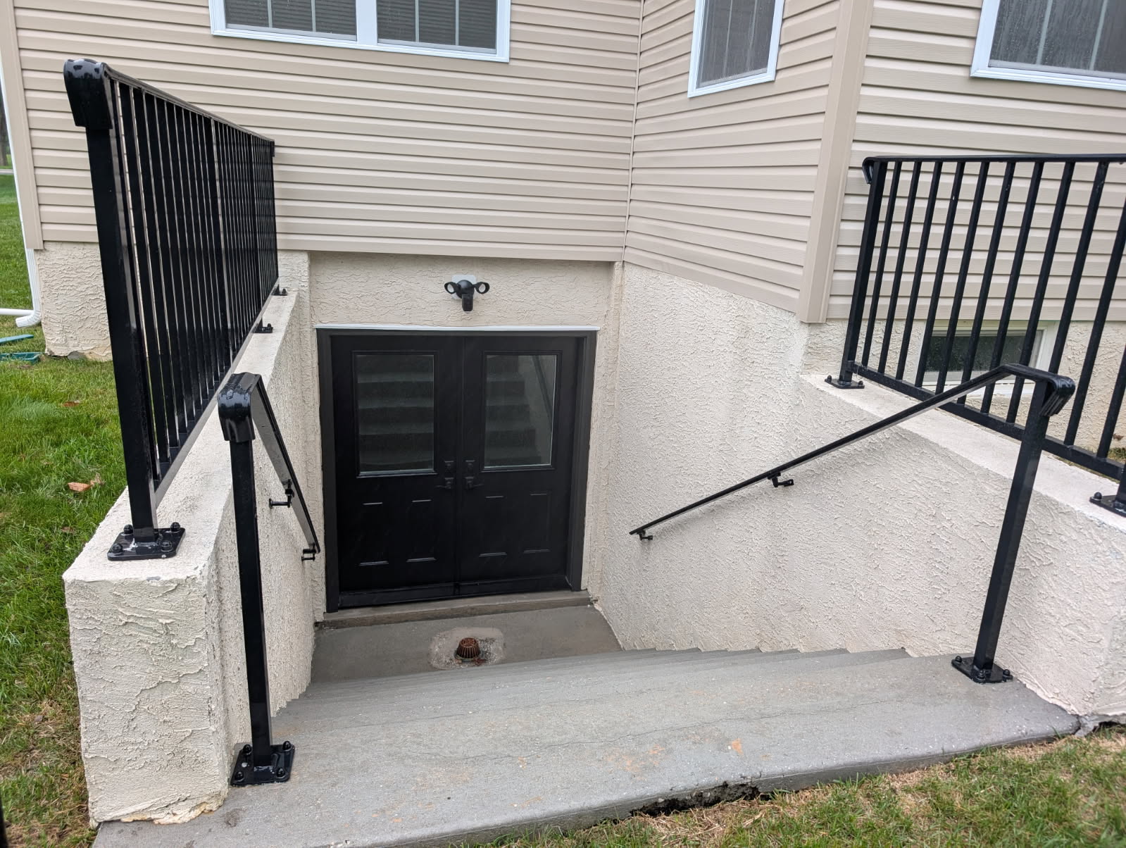 White Stairwell Leading To Front Door Of Residential House After Pressure Washing and Cleaning By Maryland Pro Wash 