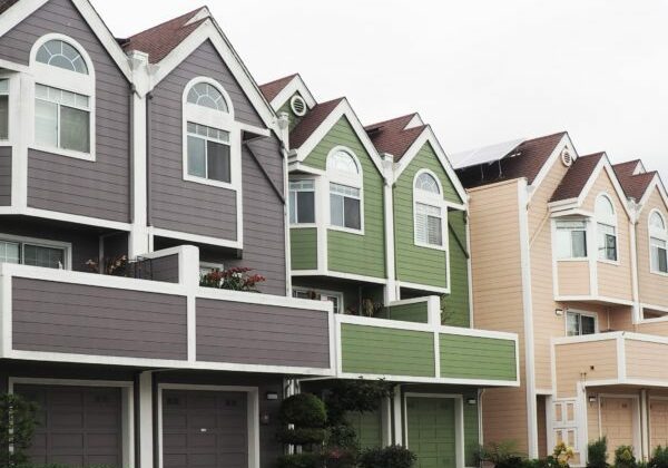 A row of colorful, modern townhouses with pointed roofs and large windows stands prominently, showcasing exteriors of gray, green, beige, and blue. They elegantly line a quiet street under an overcast sky, creating a serene atmosphere. In front of the houses is a parked car that rests peacefully along the curb.

Maryland Pro Wash takes pride in maintaining the pristine appearance of such vibrant homes throughout Harford County MD, Baltimore County MD, Cecil County MD, Howard County MD, Carroll County MD, Anne Arundel County MD; as well as Wilmington DE; New Castle County DE; and Delaware County PA. Our pressure washing services ensure these charming neighborhoods remain spotless and inviting for all to enjoy. Whether it's removing grime from siding or cleaning driveways to perfection, Maryland Pro Wash is committed to enhancing curb appeal across these regions with reliable expertise.